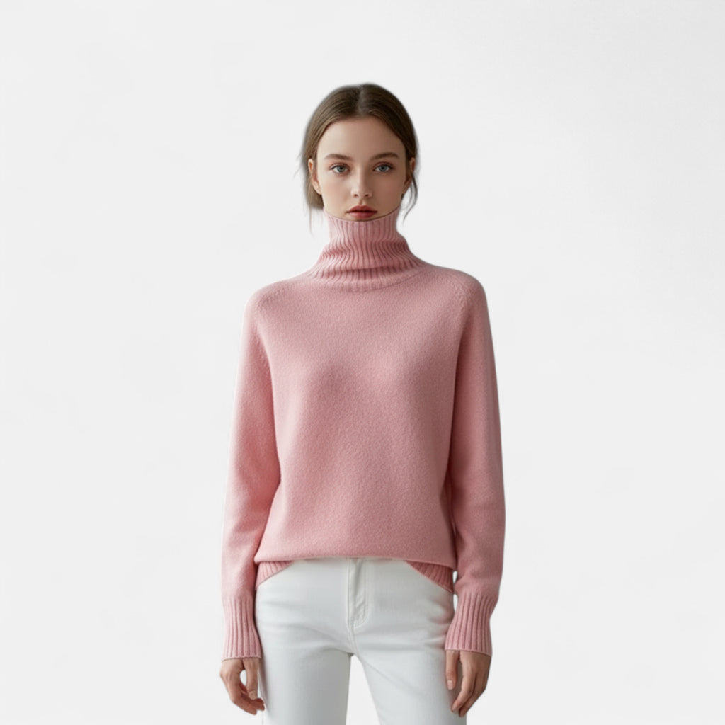 Pull rose clair en laine col roulé