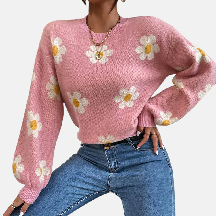 Pull rose avec fleurs