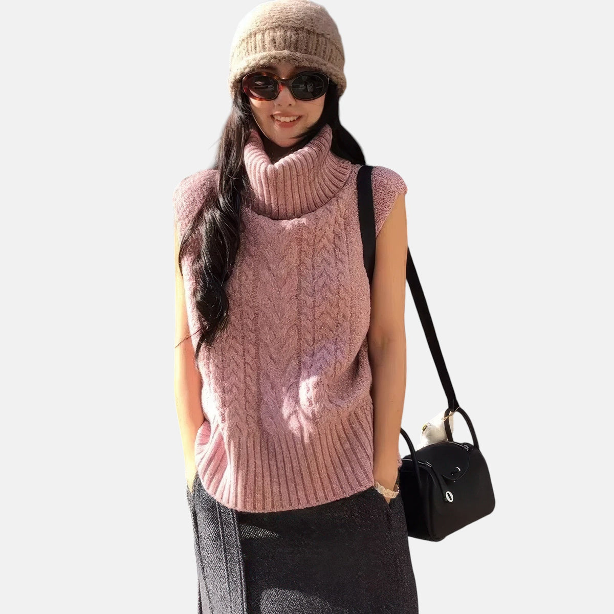 Pull sans manches rose col roulé