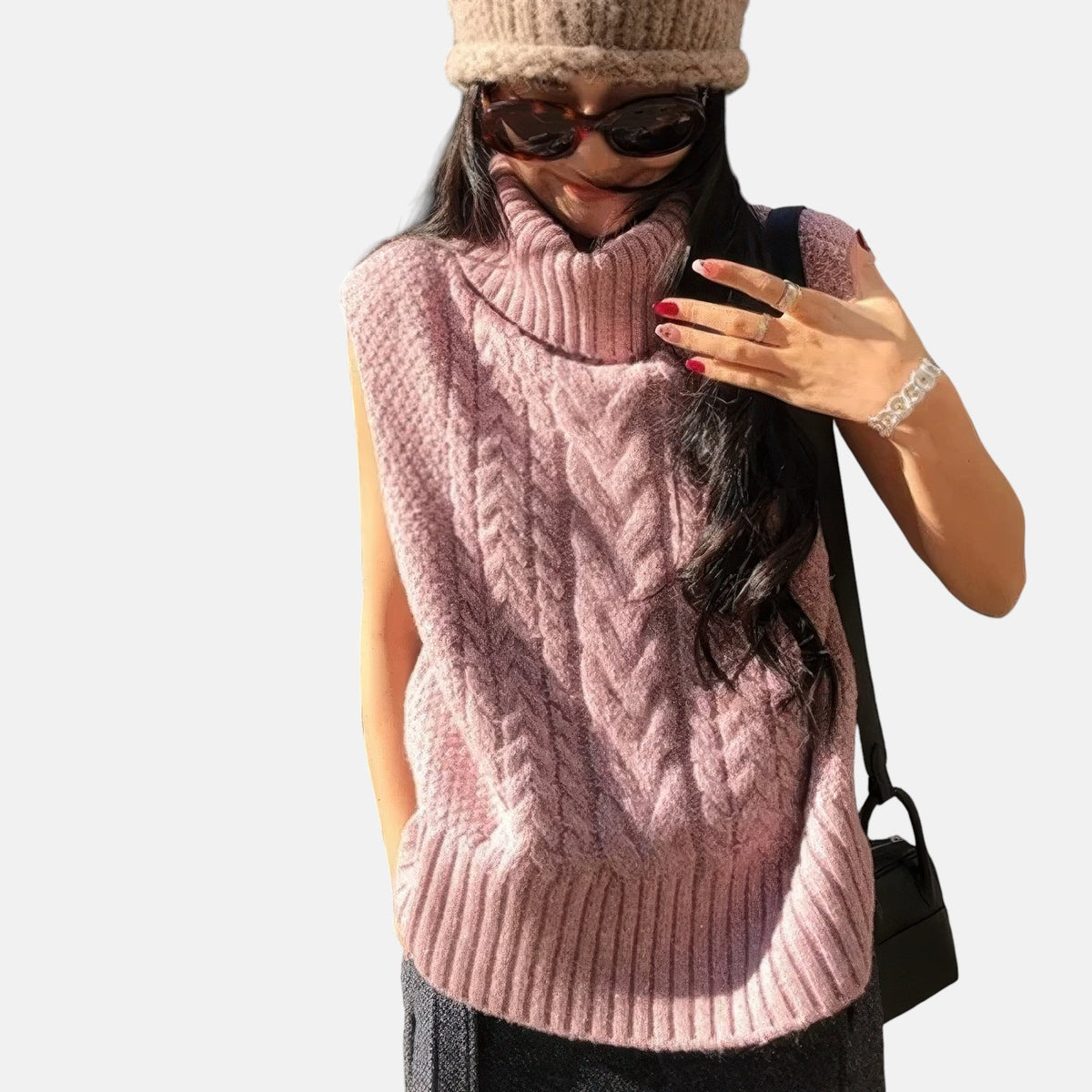 Pull sans manches rose col roulé